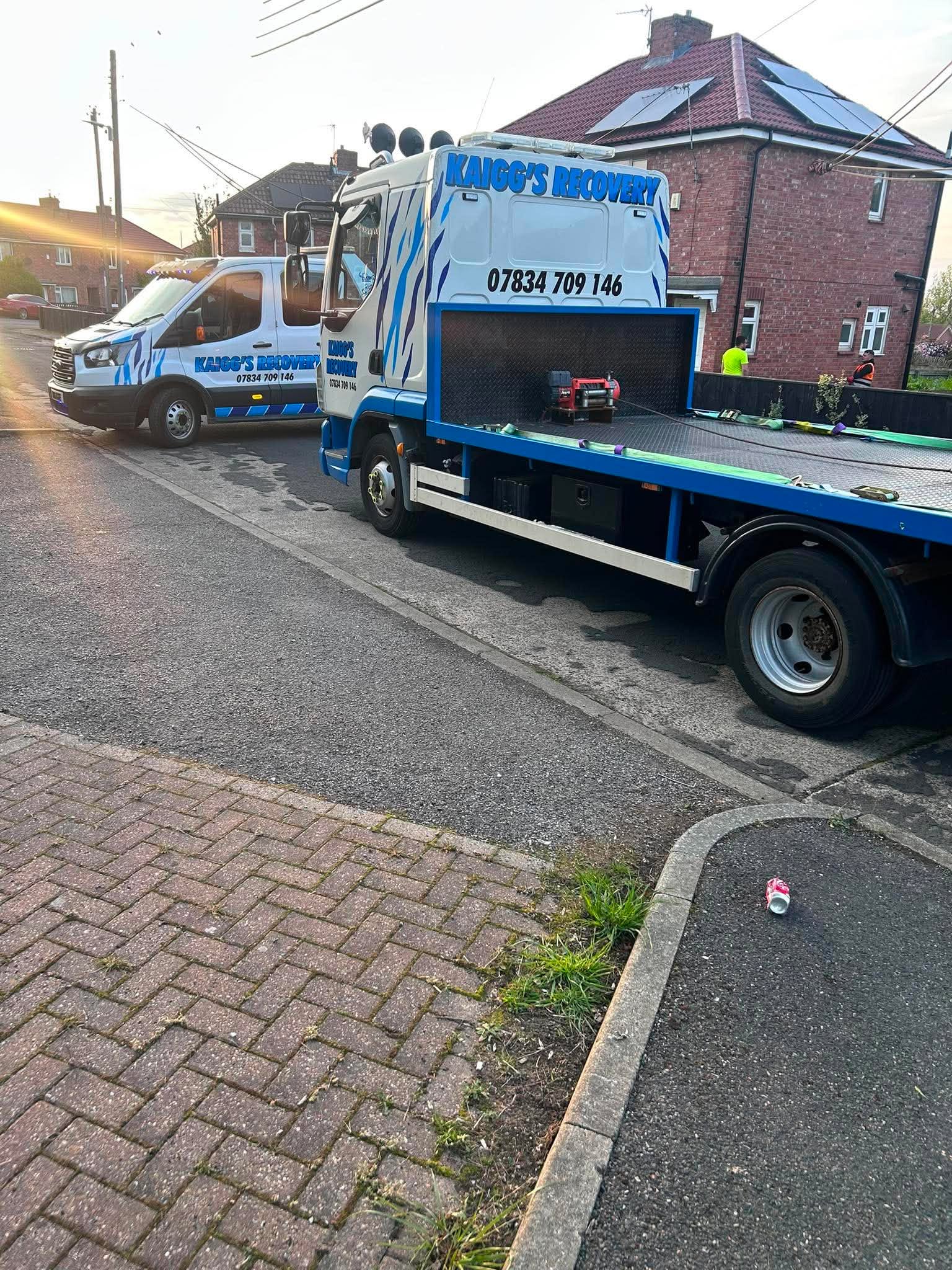 Kaigg's Recovery service van and flatbed truck